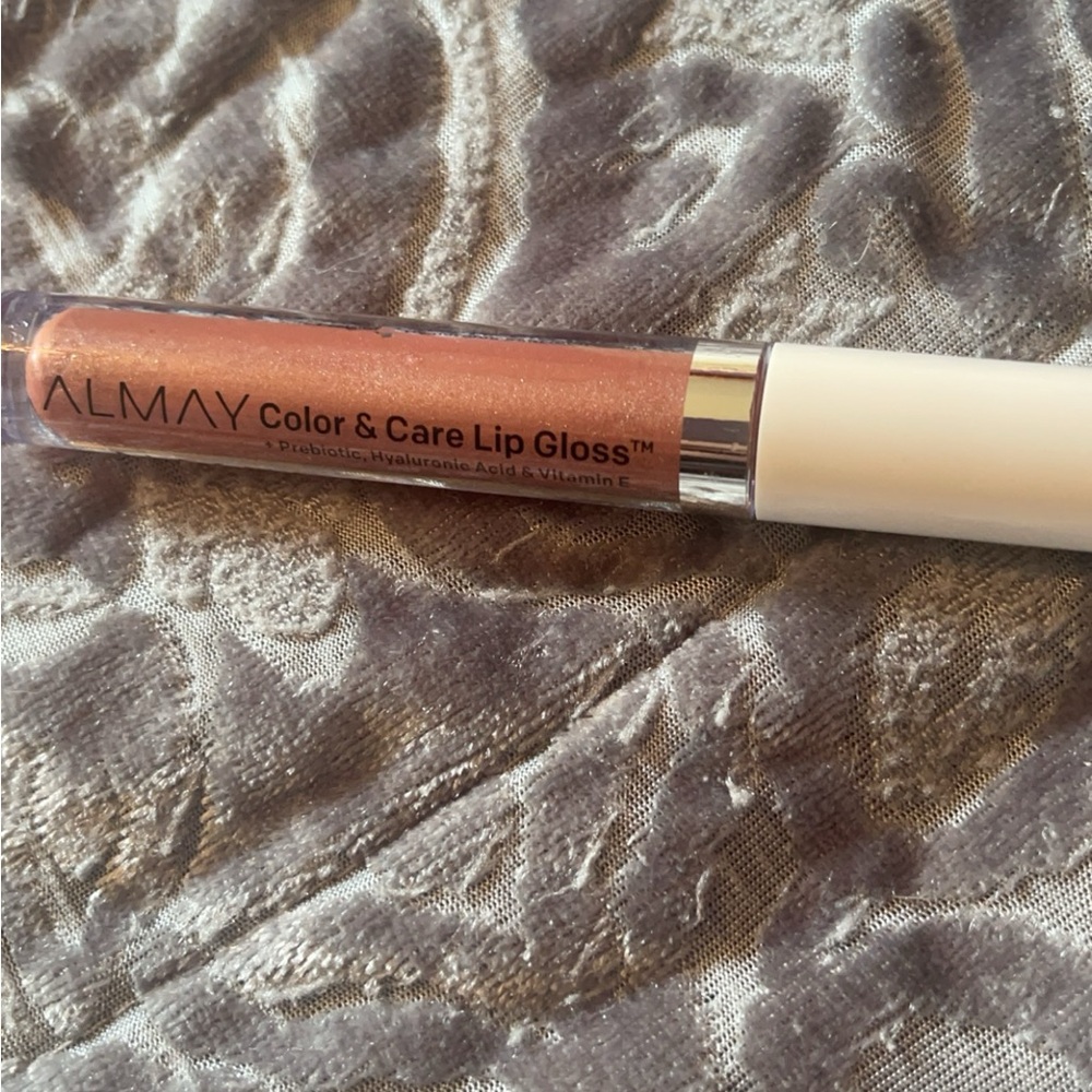 Almay color and care lip gloss